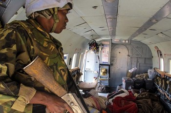 UNAMID airlifts wounded civilians from the El Sireaf locality to El Fasher for medical treatment, in this handout photograph taken by UNAMID on February 24, 2013