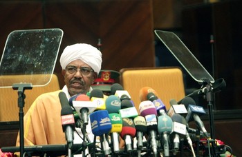 Sudanese president Omer Hassan al-Bashir addresses a new session of parliament on 1 April 2013 in the capital, Khartoum (Ashraf Shazly/AFP/Getty Images)