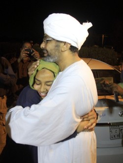 A political prisoner from Kober prison in the Sudanese capital, Khartoum, greets a relative following his release in the early hours of April 2, 2013 (ASHRAF SHAZLY/AFP/Getty Images)