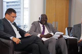 Joseph Kulang (C) makes a presentation at the summit in Cape Town, South Africa (Larco Lomayat)