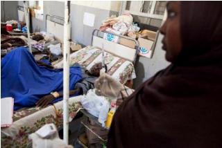 A nurse medicates a patient in the intensive-care unit of El Fasher Hospital, North Darfur. The unit has just 10 beds and is unable to accommodate all the patients requiring care (Albert Gonzalez Farran/UNAMID)