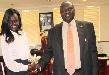 Miss World Africa, Atong Ajak De Mach, shaking hands with the country's Vice President, Riek Machar Teny, Juba, May 15, 2013 (ST)