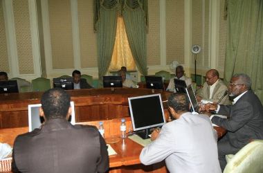 President Omer Al-Bashir chairs a meeting of the Council of Defence and National Security and FVP Ali Osman Taha at his right and VP Al-Haj Adam at his left on 16 May 2013 (ST)
