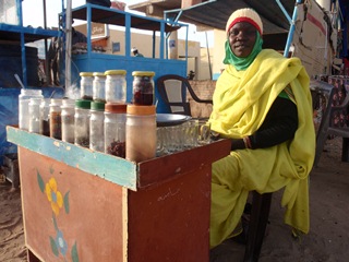 Tea ladies are a familiar site on Sudan's city streets, but are often vulnerable to abuse (ST)