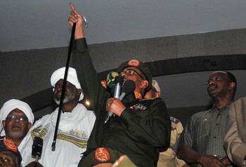 Sudanese President Omar al-Bashir delivers a speech during a ceremony to celebrate the army taking back Abu Kershola, a town which rebels of the Sudan Revolutionary Front coalition seized on April 27 during attacks in South Kordofan, on May 27, 2013 in the capital Khartoum. Bashir warned he will order the flow of oil from South Sudan to be cut off if Juba provides assistance to rebels in South Kordofan and Darfur. AFP PHOTO / EBRAHIM HAMID        (Photo credit should read EBRAHIM HAMID/AFP/Getty Images)