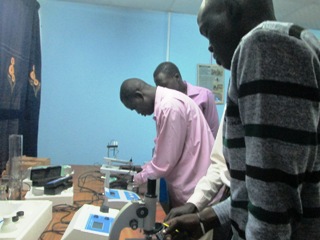 Workers at the water factory in Jonglei, June 16, 2013 (ST)