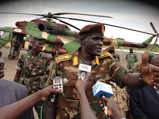 Rebel commander Johnson Olony speaks to the press upon arrival at Juba international airport on 13 June 2013 (ST)