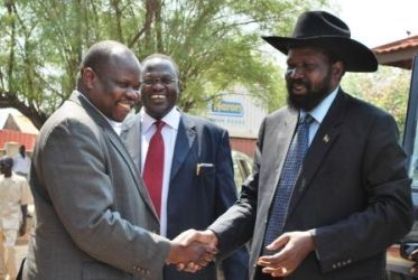 File picture from the 6th SPLM Polituro on 14 January 2010 where SPLM chairman Salva Kiir (R) greets SG Pagan Amum (L) as his deputy Riek Machar stands besides him (photo SPLM)