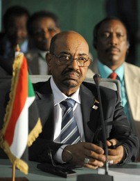 Sudanese president Omer Hassan al-Bashir takes part in an African Union health summit in Abuja on 15 July 2013 (Photo: Getty Images)