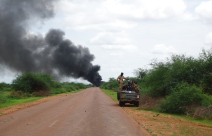 A picture extended by the Justice and Equality Movement on Saturday 27 July showing the smoke on the road of Dilling-Dibibad in South Kordofan  after an attack on a military convoy escorting fuel tankers