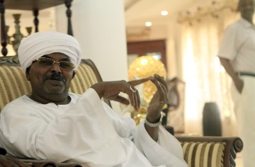 Salah Gosh, the former chief of Sudan's intelligence service, smiles following his release on July 10, 2013, in the capital Khartoum, (ASHRAF SHAZLY/AFP/Getty Images)