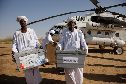A UNAMID Mi-8 helicopter brings ballot boxes and voting material to El Lait, North Darfur on for South Sudanese living in the area on 6 January 2011, days before the vote for self-determination (Photo UNAMID - Olivier Chassot)