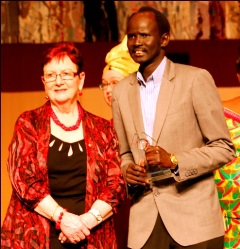 Paul Mabior Garang receiving his award at Parliament House in the Australian capital Canberra on 27 July