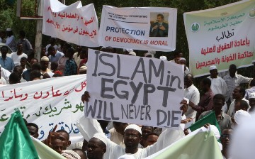 Sudanese supporters of the Muslim Brotherhood and Egypt's ousted president Mohamed Morsi protest following Friday noon prayers in front of the presidential palace in the capital Khartoum, on August 16, 2013, following the recent violence in Egypt. (ASHRAF SHAZLY/AFP/Getty Images)