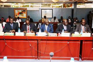 South Sudan's new finance minister Aggrey Tisa Sabuni (C) with his counterparts during the swearing-in ceremony August 7, 2013 (Photo: Larco Lomayat)