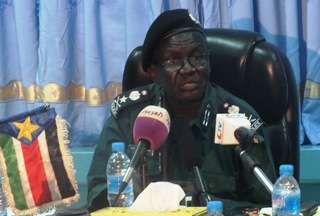 South Sudan's deputy inspector general of police Andrew Koul Nyoun speaks at a press conference in Juba August 30, 2013 (ST)