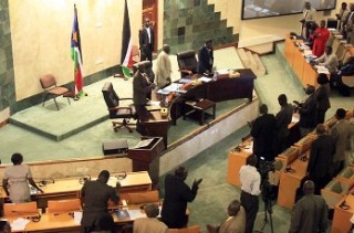 South Sudanese MPs stand during a parliamentary session in Juba on 31 August 2011 (AFP)