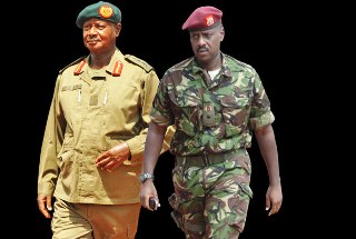 Ugandan leader Yoweri Museveni and his son Muhoozi Kainerugaba (Monitor)