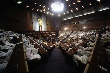 The audience listens to Sudanese president Omer Hassan al-Bashir speaking during the opening of a new session of parliament on 28 October 2013 in Khartoum (Photo: AFP/Getty Images)