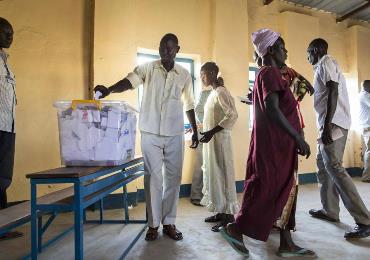 People cast their votes in an abandoned school used as a polling center in the disputed border region of Abyei, whose ownership is claimed by both Sudan and South Sudan, Sunday, Oct. 27, 2013 (Photo AP/Mackenzie Knowles-Coursin)