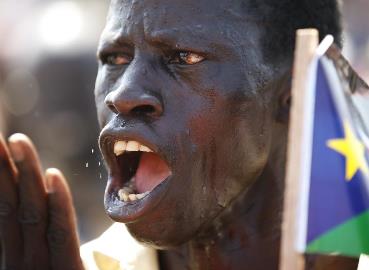 A man gestures during a rally in the town of Abyei ahead of the referendum October 26, 2013.  (Reuters/Goran Tomasevic)