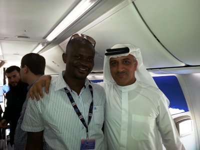 Flydubai CEO Ghaith Al Ghaith (R) with The Corporate newspaper's head of operations Othieno Ogeda in Dubai, November 18, 2013 (corporate photo)
