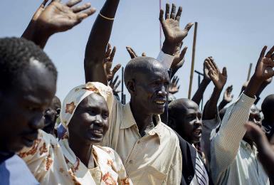 Abyei residents chant “Bye Bye, Bashir”, referring to Sudanese president Omer Hassan al-Bashir, after the result of an unofficial vote was announced in the disputed border region on 31 October 2013 (Photo: AP/Mackenzie Knowles-Coursin)