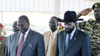 South Sudan president Salva Kiir (R) and Riek Machar paying respect at the grave of late South Sudanese rebel leader John Garang in Juba May 10, 2010(AP/Pete Muller)