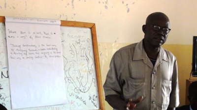 Clement Laku speaks at a youth dialogue organised by SSYPA in the capital, Torit, December 15, 2013 (ST)