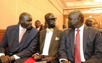 Grang Demebiar (C), the son of late Sudanese politician John Garang, talks to unidentified members of South Sudan rebel delegation during the opening ceremony of South Sudan's negotiation in Ethiopia's capital Addis Ababa, January 4, 2014 (Photo Reuters/Tiksa Negeri)