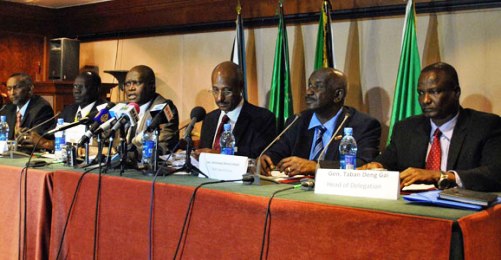 From left: IGAD’s executive secretary Mahmoud Maalim, acting head of the South Sudan delegation, Makuei Lueth, IGAD special envoys Lazarus Sumbeiywo, Seyoum Mesfim and Mohamed Ahmed al-Dabi, head of South Sudan’s rebel delegation Taban Deng hold a joint press conference in the Ethiopian capital, Addis Ababa, on 6 January 2014 (Photo: AFP/Carl De Souza)