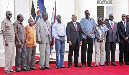 Kenyan president Uhuru Kenyatta (C) receives seven of the 11 political leaders accused of plotting a failed military coup in South Sudan in December, in Nairobi on 29 January 2014. Also pictured is retired Kenyan general Lazaro Sumbeiywo (second right) and director-general of Kenya's National Security Intelligence Service (NSIS) Michael Gichangi at far right (Photo: AP/Kenyan presidency)