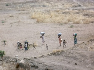 Children sit in front of their shelter in Bram village in the Nuba Mountains in South Kordofan on 28 April 2012 (Photo: Reuters)