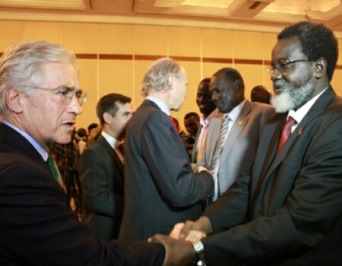 Members of the South Sudanese delegation meet western observers ahead of peace talks in the Ethiopian capital, Addis Ababa, on 4 January 2014 (AP)