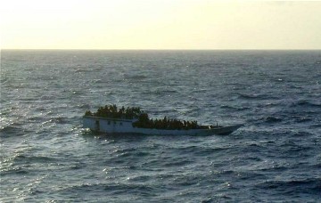 FILE - A picture released by the Australian Maritime and Safety Authority (AMSA) shows a boat which according to the AMSA was taken mid-morning before the boat sank near Christmas Island June 27, 2012 (Reuters)