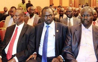 South Sudanese rebel delegation chief Taban Deng (left) and members of his delegation attend talks in Addis Ababa on January 4, 2014 to try and broker a ceasefire (AFP/Solan Gemechu)