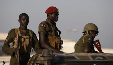 South Sudan SPLA soldiers stand in a vehicle in Juba December 20, 2013 (REUTERS/Goran Tomasevic)