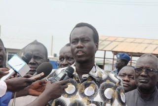 South Sudan's deputy information minister, Akol Paul Kordit speaking at a public rally in Juba on 11 February 2014 (ST)