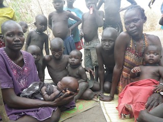 Two women who gave birth under trees in Lakes state's Minkaman camp for displaced people (ST)
