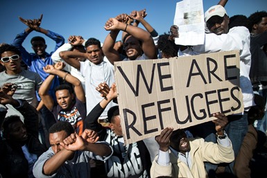 Tens of thousands of illegal immigrants from Africa protested in Tel Aviv in January, calling for changes to Israel's policies on asylum seekers (Photo: Uriel Sinai/Getty Images)