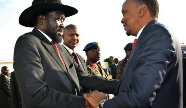 Kenyan president Uhuru Kenyatta (right) shakes hands with South Sudanese president Salva Kiir during a visit to Juba in December for talks on the spiralling crisis facing the country (AFP)