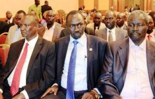 South Sudanese rebel delegation chief Taban Deng (left) and members of his delegation attend talks in Addis Ababa on January 4, 2014 to try and broker a ceasefire (AFP/Solan Gemechu)