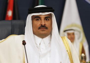 Emir of Qatar Sheikh Tamim bin Hamad al-Thani attends the 25th Arab Summit in Kuwait City, March 25, 2014 (REUTERS/Hamad I Mohammed)