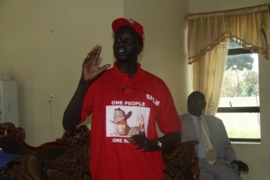 Youth League chairman Akol Paul Kordit speaks at a rally in support of South Sudan's ruling SPLM in the Western Equatoria state capital, Yambio, on 8 March 2014 (ST)