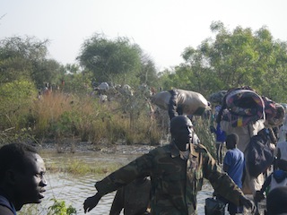 People fleeing to the bush from Bor when the South Sudanese rebels attacked the Jonglei capital in December 2013. (Photo: John Actually/ST)