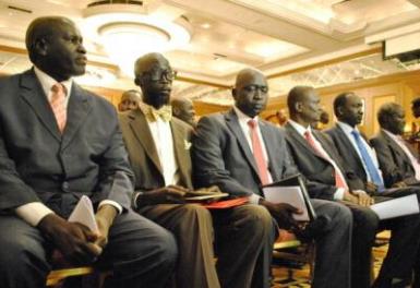 Members of the delegation opposed to the South Sudanese government, including Grang Demebiar (second on left) and the son of late Sudanese politician John Garang, attend talks on 4 January 2014 in Addis Ababa, Ethiopia (Photo: Jacy Fortin/AFF/Getty)