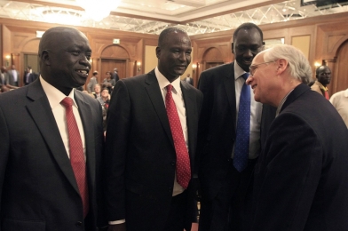 Rebel chief negotaitor,Taban Deng Gai, (C) talks to US envoy Donald Booth (R) during the opening ceremony of peace talks in Addis Ababa on 4 January 2014  (Photo: AFP/Carl de Souza)