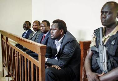 South Sudan political detainees (left to right) Ezekiel Lol Gatkuoth, Majak d’Agoot, Pagan Amum and Oyai Deng Ajak at a trial hearing in Juba on 11 March 2014 (Photo: AFP/Andrei Pungovschi)