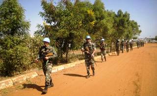 UNMISS troops from India patrol the perimeters of a compound in South Sudan's capital, Juba (AP)