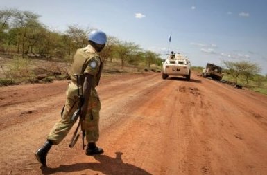 An officer from the UN peacekeeping mission in Abyei (UNISFA) on patrol in the disputed region, claimed by both Sudan and South Sudan (AFP)
